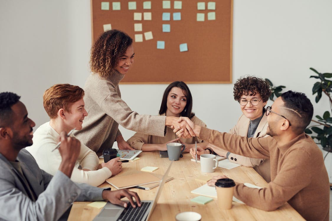 VS Joblink leadership team in a modern office